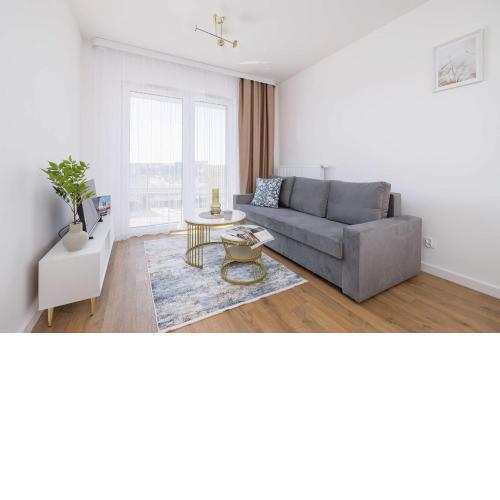 Jasny Apartament z Umeblowanym Balkonem w Krakowie Blisko Stawu by Noclegi Renters