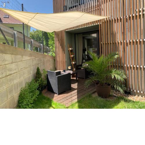 Jezerní apartmán s terasou a saunou v Lakepark Residence