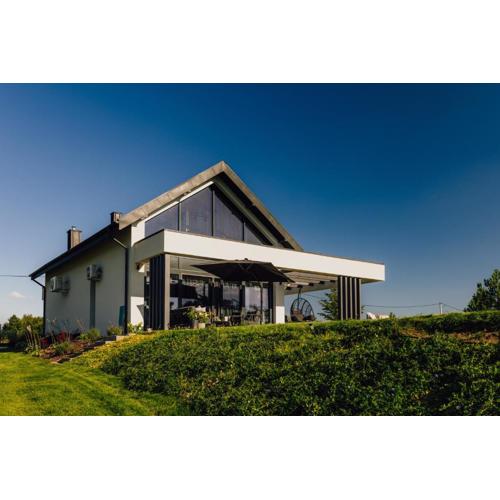 Kalwa Lake House - dom nad jeziorem z prywatnym pomostem i jacuzzi oraz sprzętem wodnym