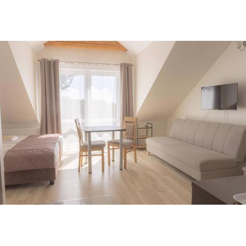 Karla, apartamenty i pokoje w Dębkach