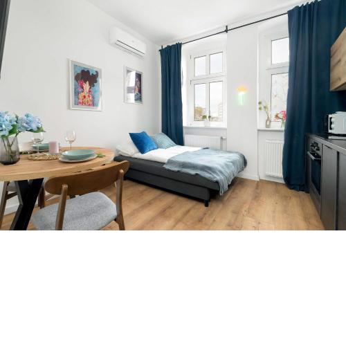 Klimatyzowane i Stylowe Apartamenty w Poznaniu Blisko Parku by Noclegi Renters
