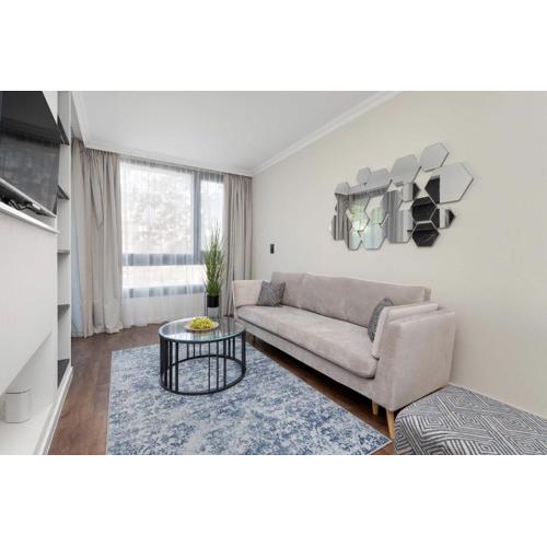 Klimatyzowany Apartament w Mielnie z Parkingiem Blisko Plaży i Jeziora by Noclegi Renters