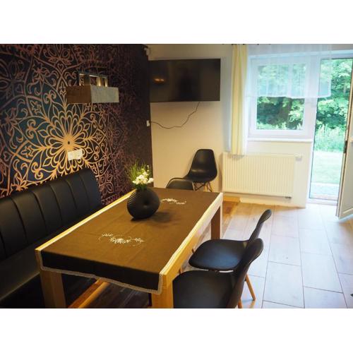 Komfortowy apartament z bezpośrednim wyjściem na ogród