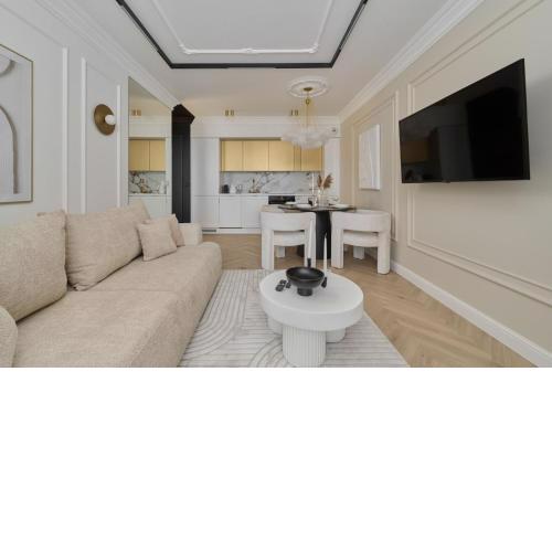 Luxurious 13th Floor Beige Apartment in Wrocław with Furnished Balcony by Renters Prestige