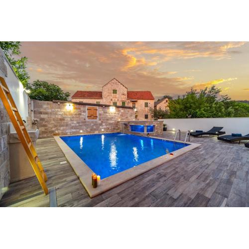 Luxury Villa David with a private boat, heated pool, jacuzzi and sauna