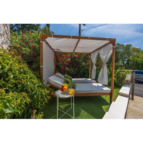 Malerisches Apartment direkt am Strand mit Lounge-Bett, Privatparkplatz, Klima, WiFi