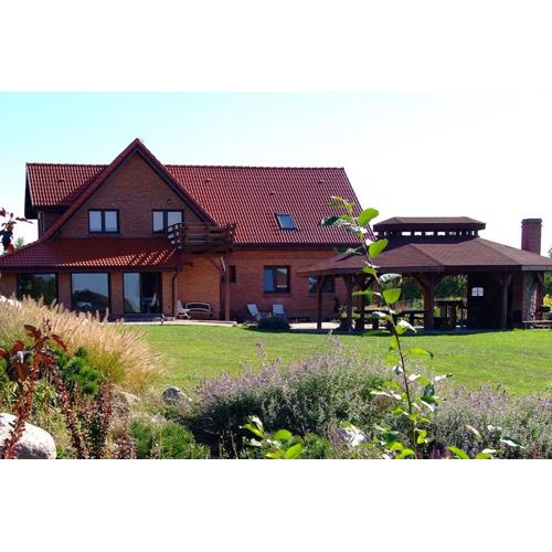 Mazury całoroczny dom nad jeziorem do wynajęcia z własną linią brzegową