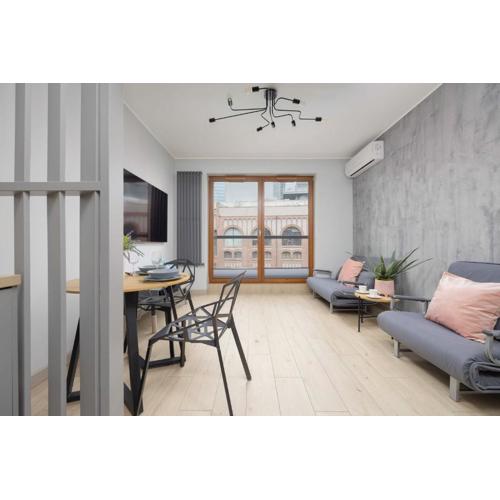 Metro Wola Apartment with Parking & AC next to Warsaw Rising Museum by Noclegi Renters