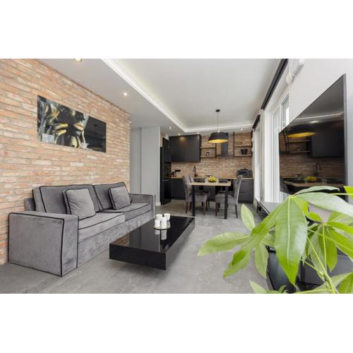 Milionowa Loft Apartment with Parking in Łódź by Noclegi Renters