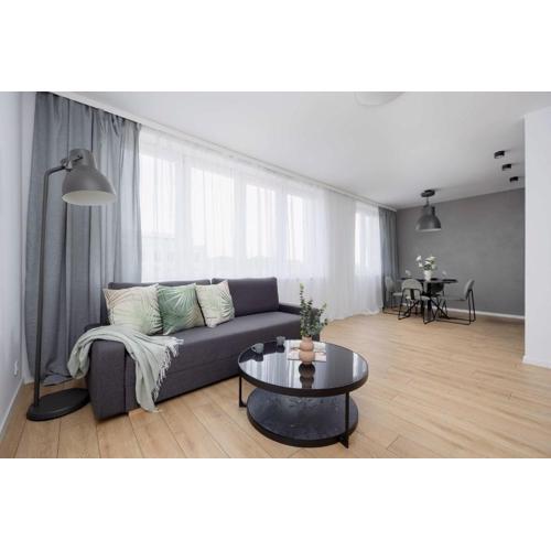 Modern and Bright Apartment with Parking Perfect for Remote Working by Noclegi Renters