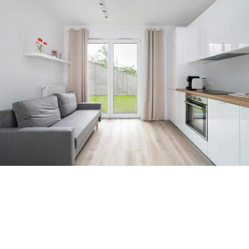 Modern Apartment Janickiego For 2 Adults and 2 Children with Parking near MTP by Noclegi Renters