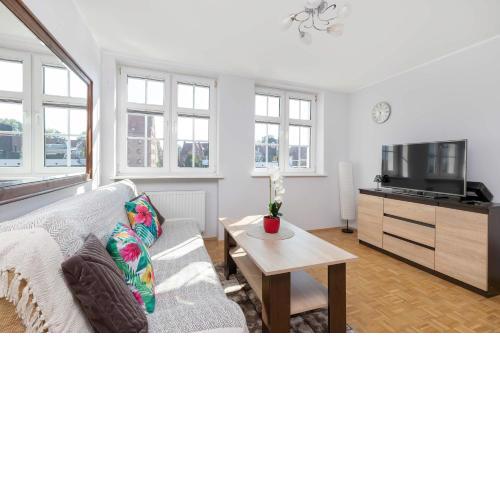 Modern Apartment with a View of the Motlawa River in Gdańsk by Rent like home