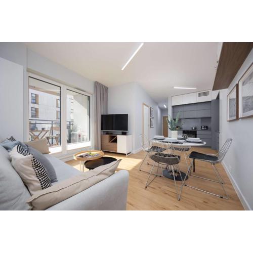 Modern Apartment with Air Conditioning and Parking Near the PGE Stadium in Warsaw by Noclegi Renters