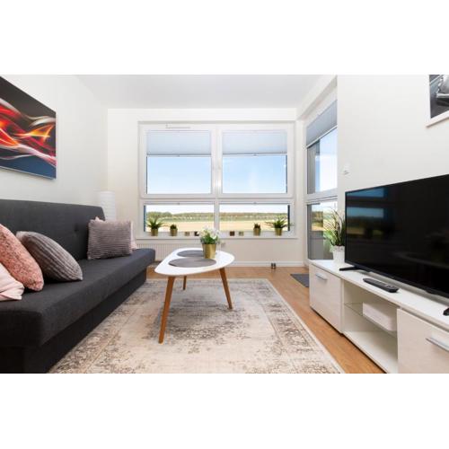 Modern Apartment with Parking and Balcony in Gdynia by Noclegi Renters