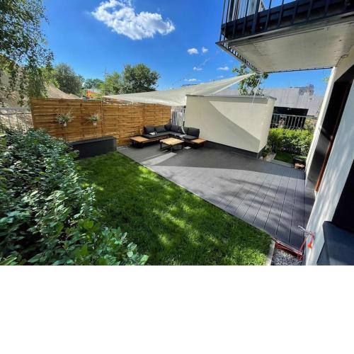 Modern apartment with spacious backyard by Matt