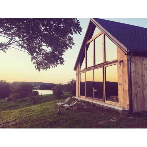 Modern Barn Home & Sauna by the lake, przytulnastodola, Stodoła nad jeziorem na Mazurach