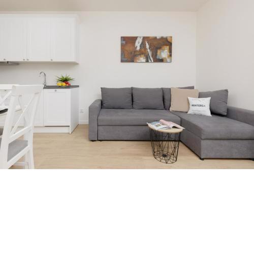 Modern Family Apartment with Parking by Noclegi Renters
