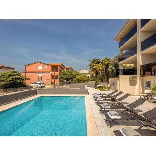 Modern home with balcony and swimming pool