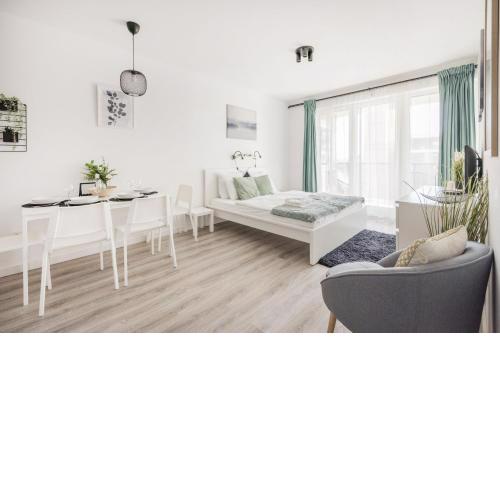 Modern Riverfront Apartment with Free Parking