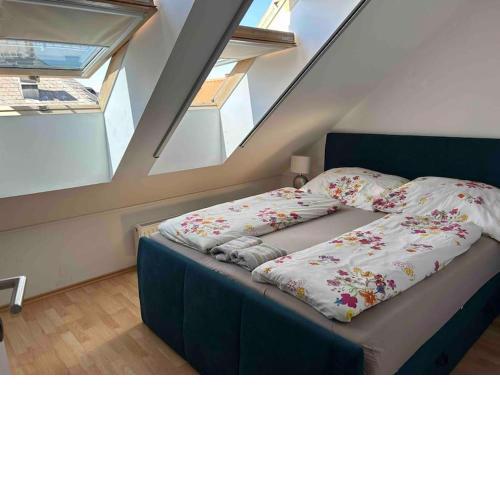 Moderne Dachgeschosswohnung in bester Lage - Self Check In