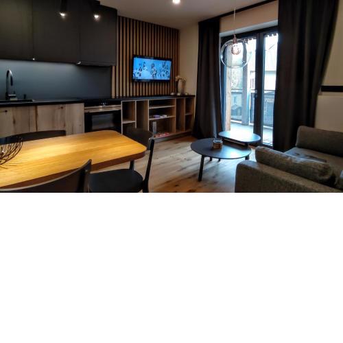 Moderní rodinný 3KK apartmán D8 v centru Harrachova s výhledem na skokanské můstky - by Relax Harrachov