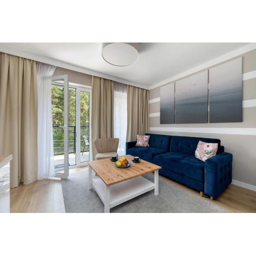 Nadmorski Apartament w Pobierowie z Parkingiem oraz Basenem by Noclegi Renters