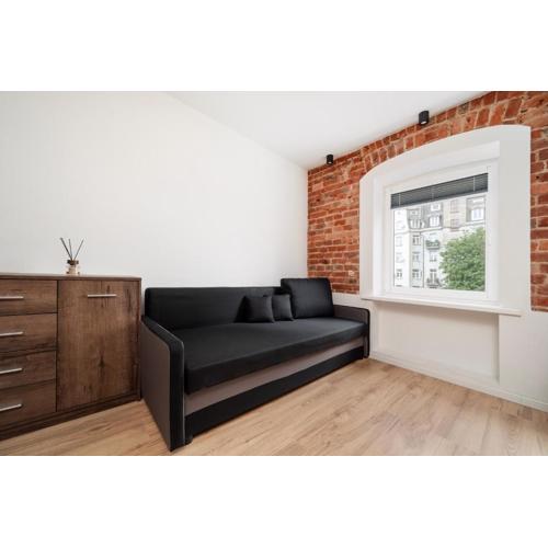 Nawrot Cosy Loft Studio by BookingHost