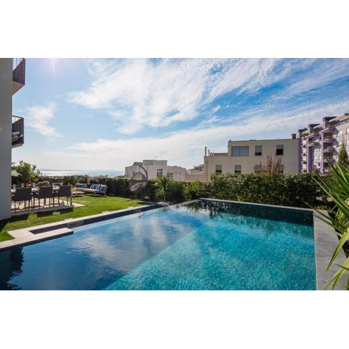 New luxury apartment with PRIVATE Heated POOL and amazing terrace with seaview