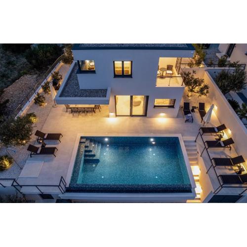 NEW! Stylish Villa Olea with heated pool and panoramic sea views