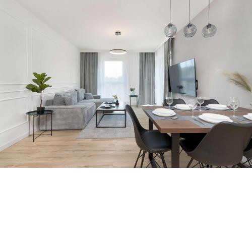 Nowa Letnica Apartment with Balcony & Parking Arena Gdańsk by Noclegi Renters