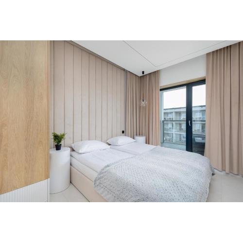Nowoczesny Apartament Przy Plaży z Parkingiem by Noclegi Renters