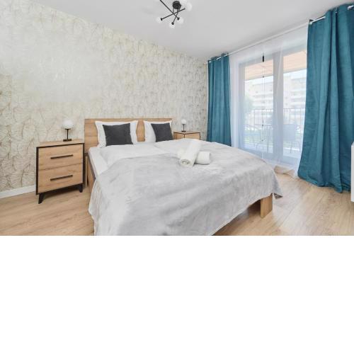 Nowoczesny Apartament z Balkonem i Parkingiem w Centrum Wrocławia by Noclegi Renters