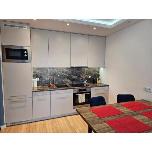 Nowoczesny i komfortowy apartament przy ulicy Kurpiowskiej blisko centrum miasta