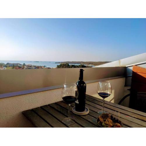 Old town rooftop studio with ocean view