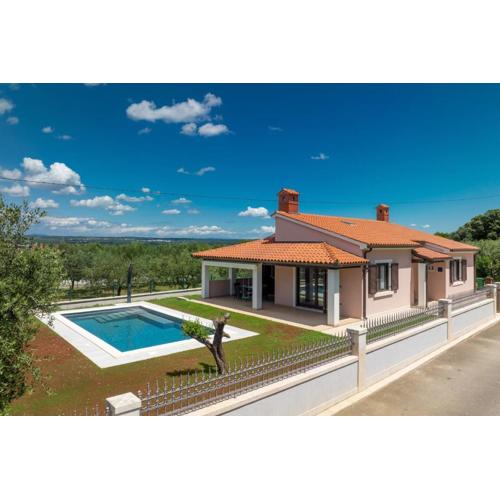 Olive tree oasis with heated pool