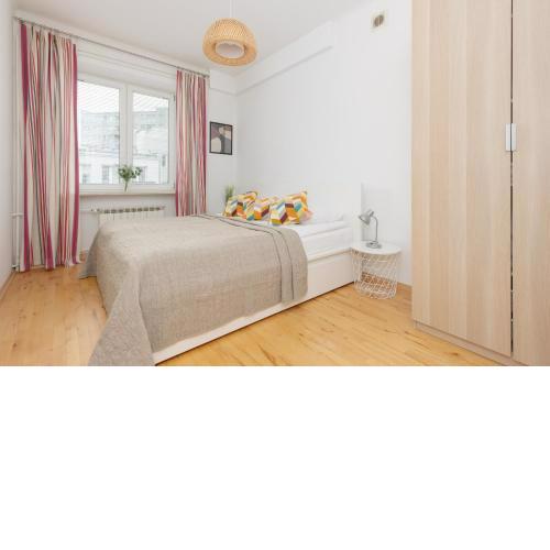 One-Bedroom Capital Apartment by Noclegi Renters
