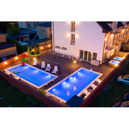Pod Winogronem - Apartamenty z basenem i wyżywieniem