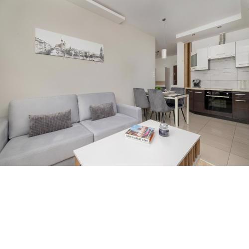 Podgórze Air-Conditioned Family Apartment with Parking by Noclegi Renters