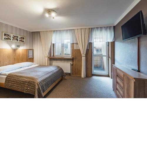 Pokoje Gościnne i Apartamenty Krupówki 19