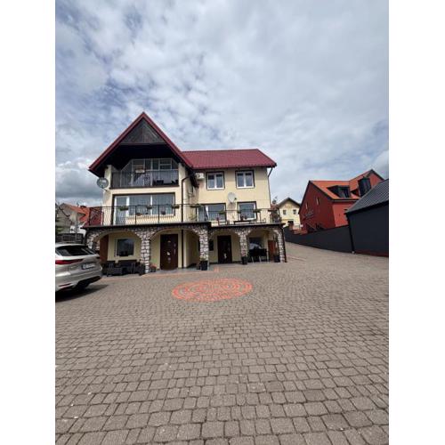 Pokoje nad jeziorem Mikołajki
