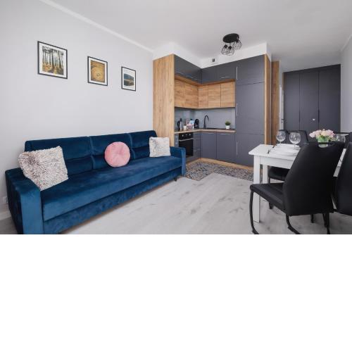 Przestronny Apartament z Balkonem by Noclegi Renters