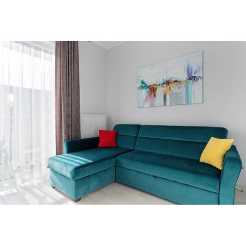 Przestronny Apartament z Balkonem i Parkingiem Blisko Morza by Noclegi Renters