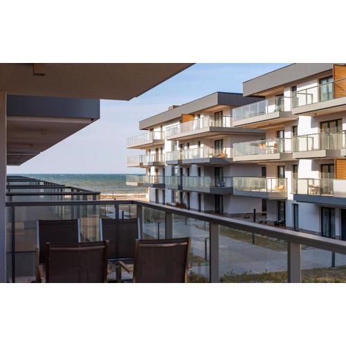 Przytulne i Nowoczesne Apartamenty Sun Seasons 24 w Dziwnowie z Parkingiem by Noclegi Renters