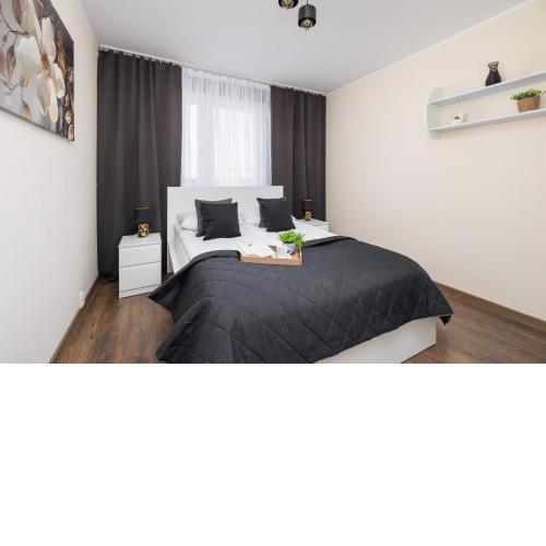Przytulny Apartament z 3 sypialniami z Biurkiem do Pracy Zdalnej by Noclegi Renters