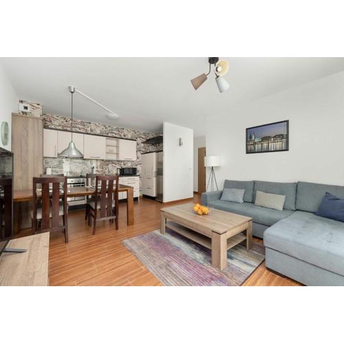 Przytulny apartament z Parkingiem by Noclegi Renters