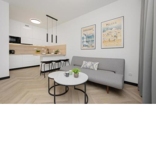 Przytulny Apartament z Parkingiem i Tarasem w Warszawie by Noclegi Renters