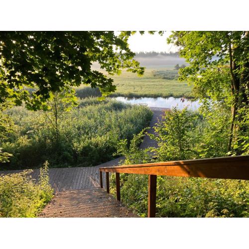 Pustelnia Supraśl - domki nad rzeką