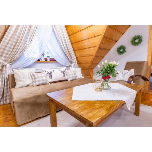 Rodzinny Dom i Apartamenty u Ciwersa z balią w ogrodzie