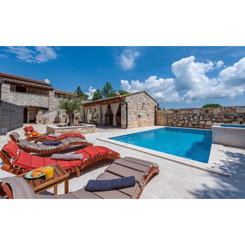 Rustic stone holiday house with pool