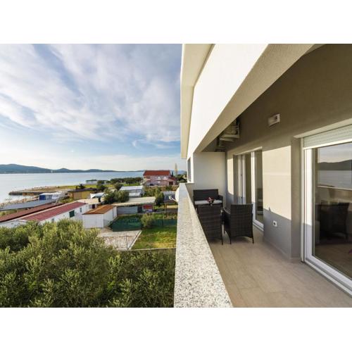 Sea-View Apartment with Garden